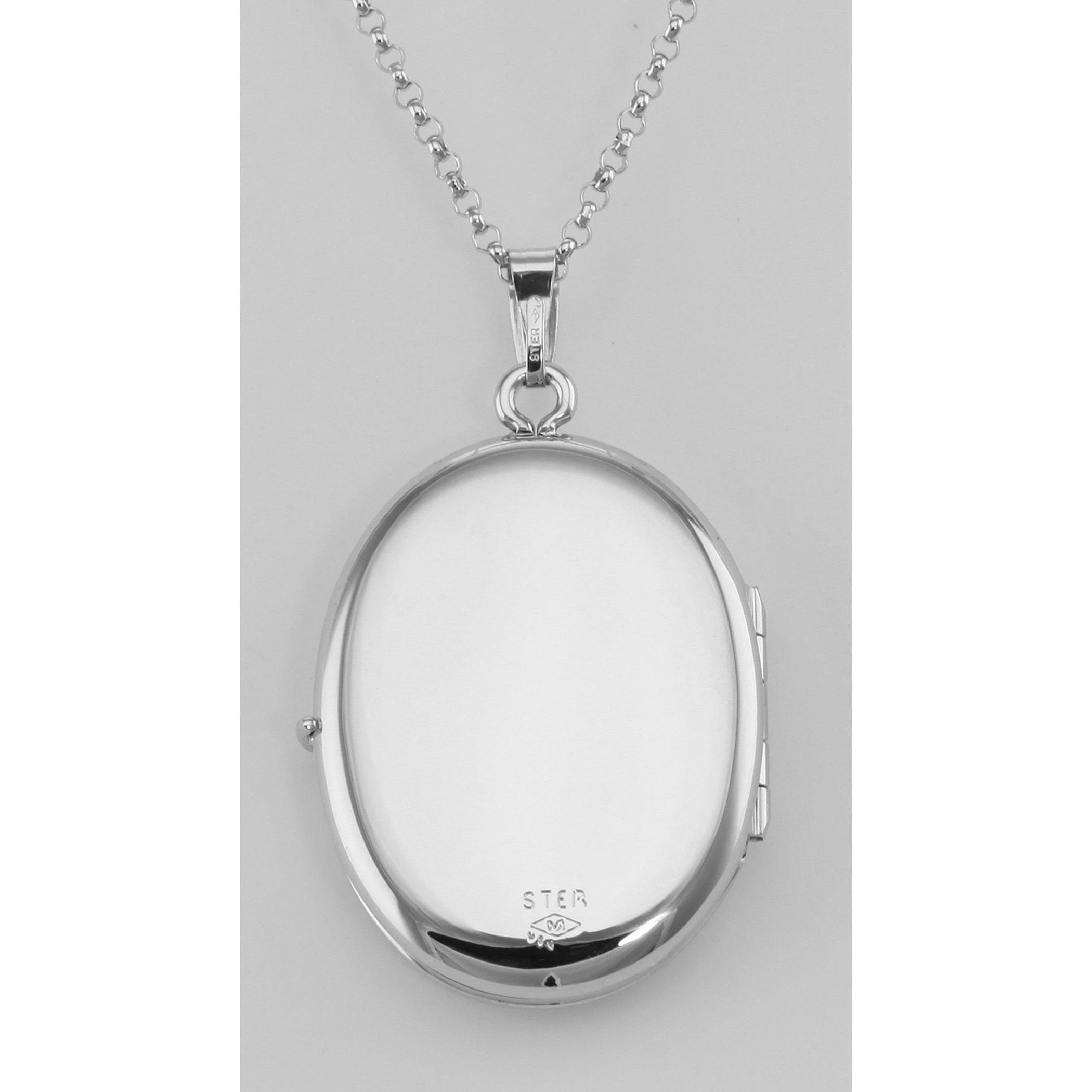Detail view of Oval (4) Four Photo Locket with Chain made in the USA highlighting design details