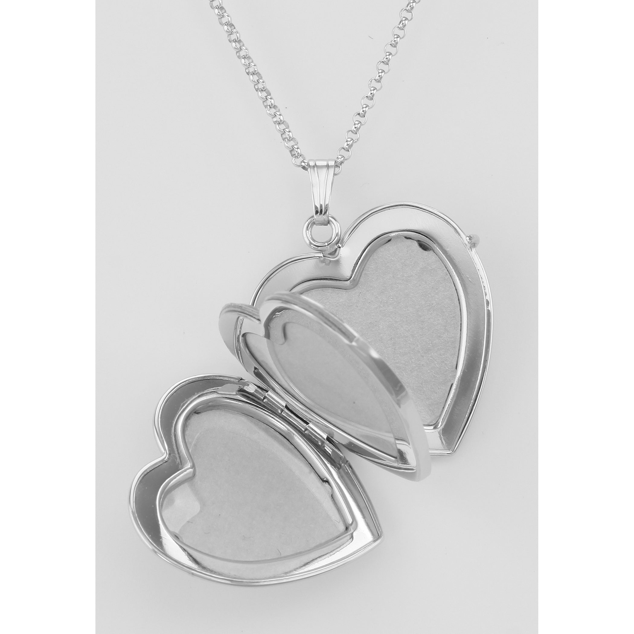 Detail view of (4) Four Photo Heart Locket with Chain - USA highlighting design details