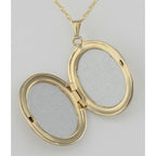 Detail view of 14K Gold Filled Oval Locket with Border Design with Chain 23mm USA highlighting design details