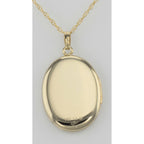Back view of 14K Gold Filled Oval Locket with Border Design with Chain 23mm USA showing 925 sterling silver hallmark and spri