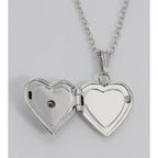 Detail view of Silver Child's Flower Heart Locket Children's - 13mm highlighting design details