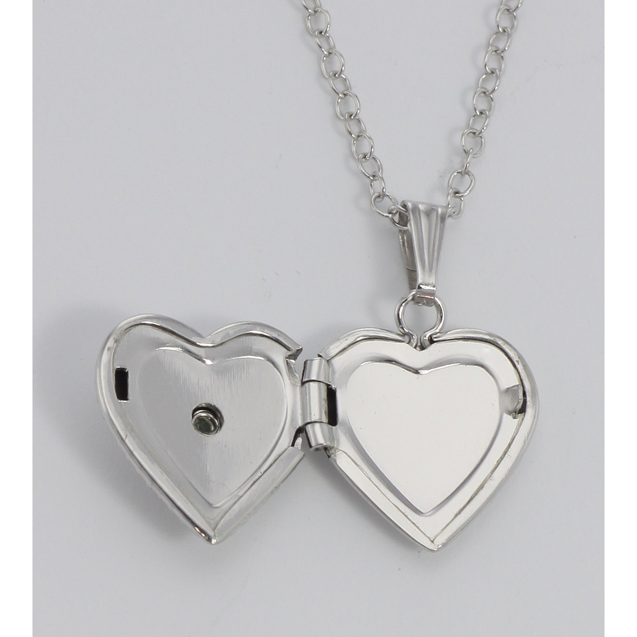 Detail view of Silver Child's Flower Heart Locket Children's - 13mm highlighting design details