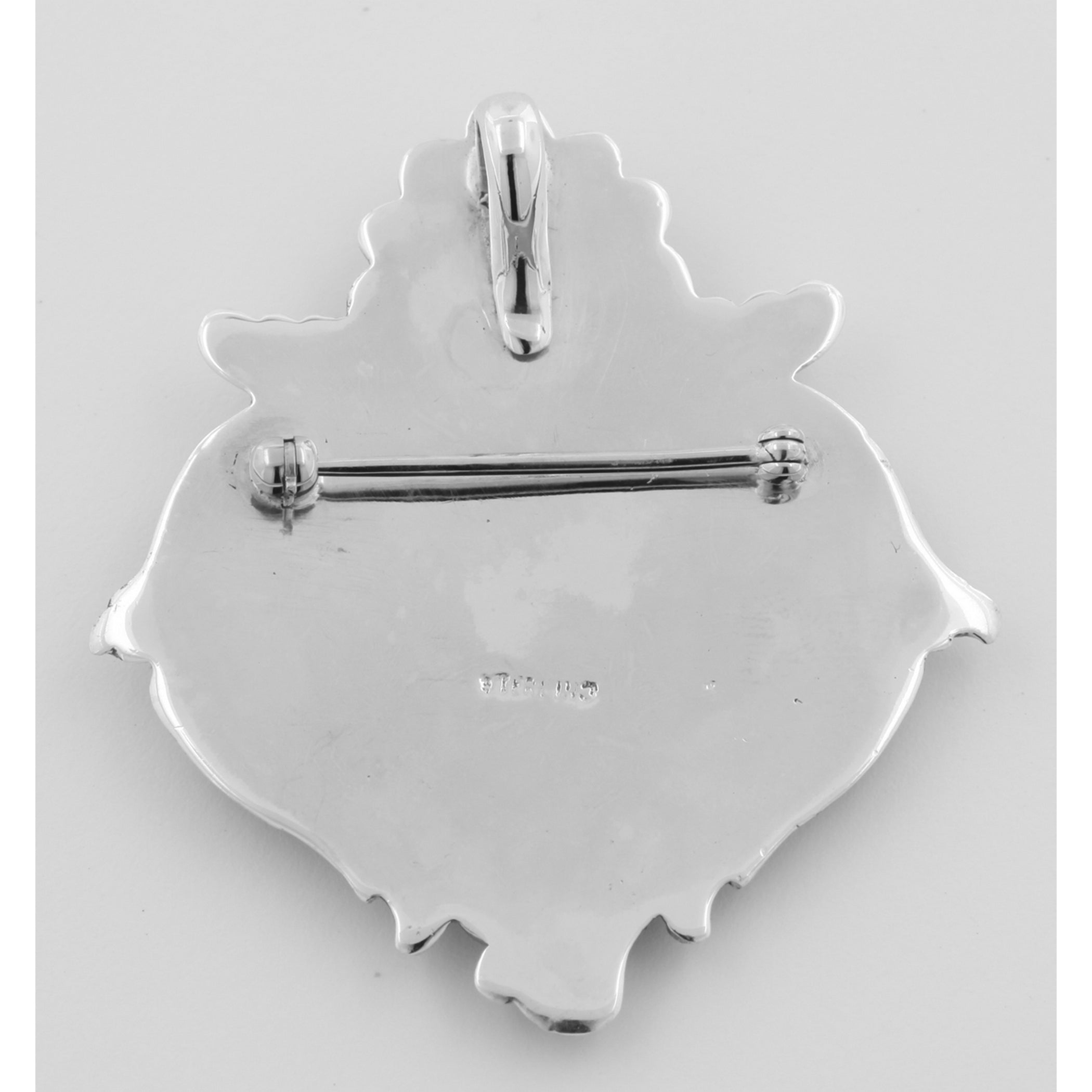 Detail view of Art Nouveau Style Cherub Pin or Pendant highlighting design details