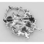 Back view of Cupid / Cherub Pin or Brooch or Pendant showing 925 sterling silver hallmark and spring ring clasp