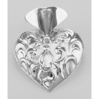 Detail view of Victorian Style Repousse Heart Vase Pin highlighting design details