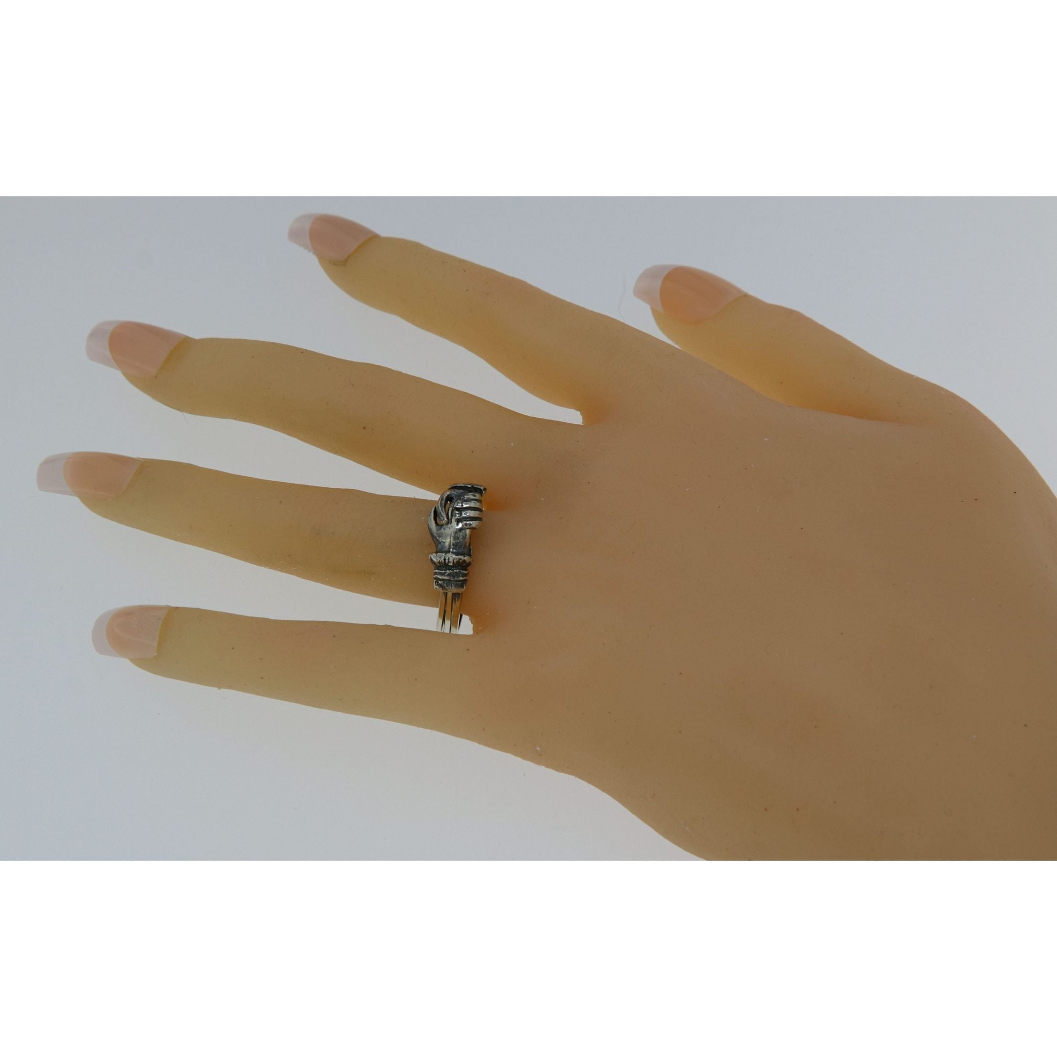 Detail view of Irish Claddagh Friendship Ring opens shows Heart highlighting design details