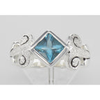 Back view of Genuine Princess Cut Blue Topaz Ring showing 925 sterling silver hallmark