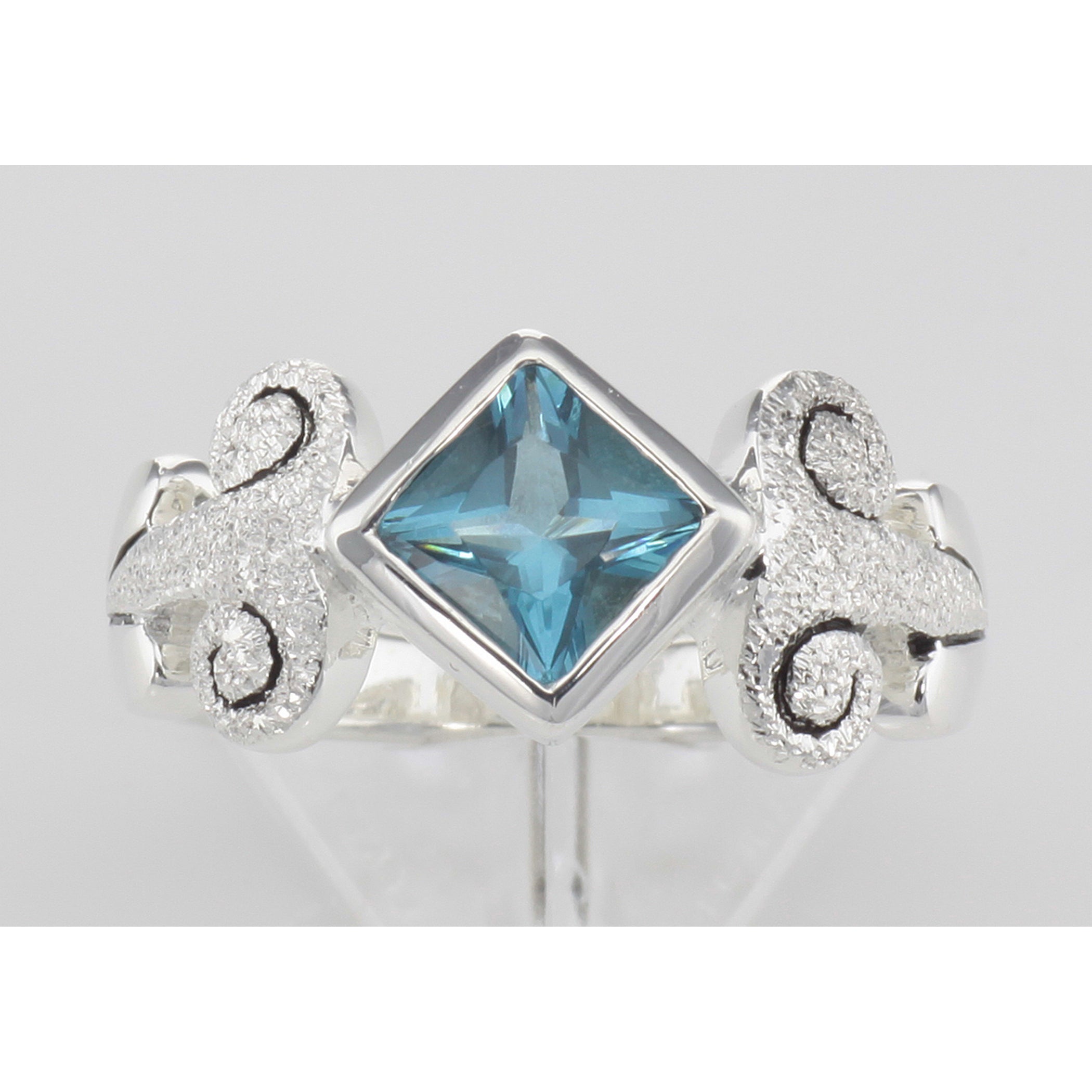 Back view of Genuine Princess Cut Blue Topaz Ring showing 925 sterling silver hallmark