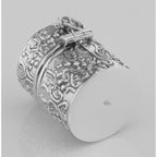 Detail view of Antique Style Repousse Sewing Thimble Case highlighting design details