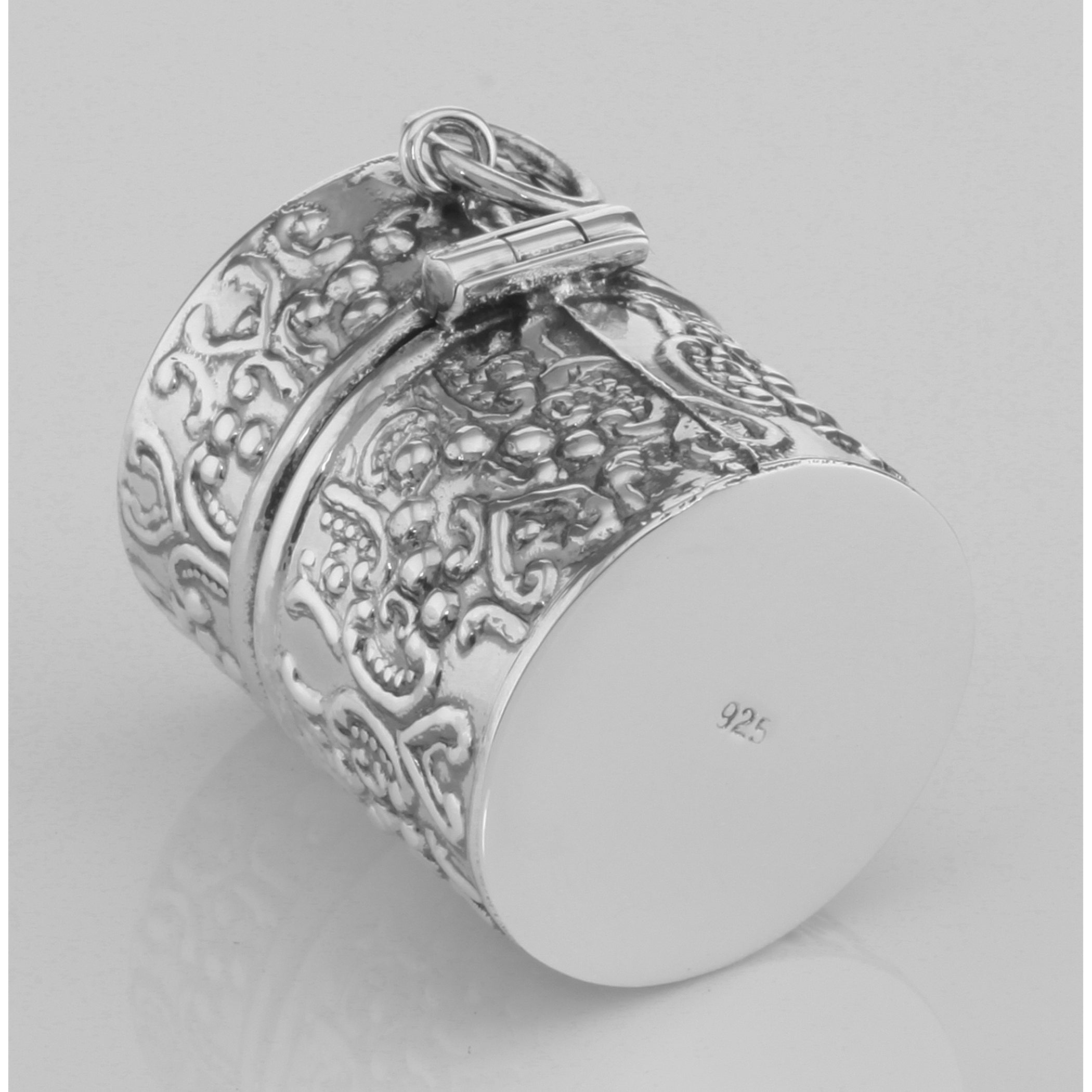 Detail view of Antique Style Repousse Sewing Thimble Case highlighting design details