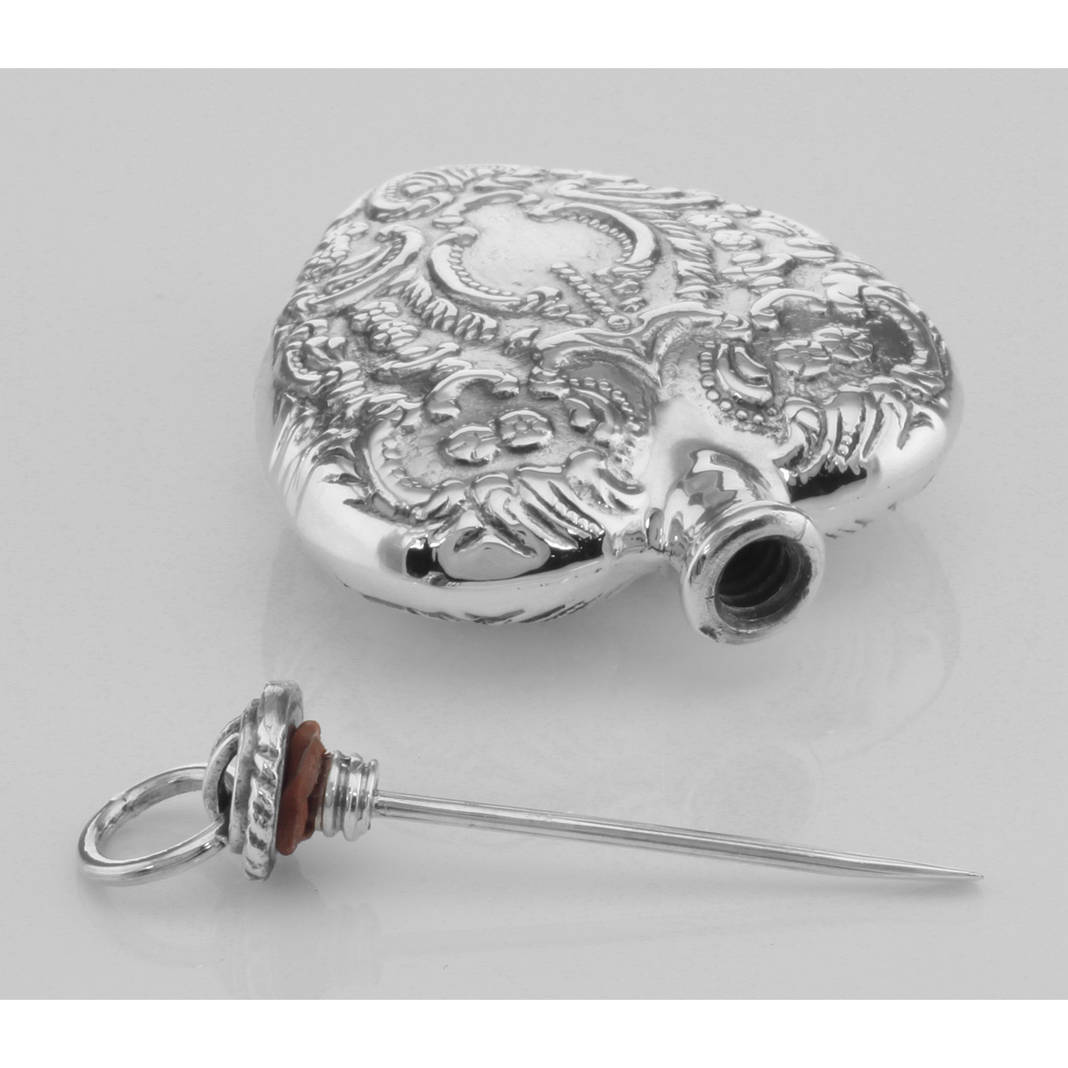Detail view of Classic Small Heart Perfume Bottle or Memorial Ash Pendant highlighting design details