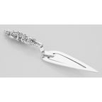 Detail view of Victorian Style Repousse Trowel Bookmark in Fine Sterling Silver highlighting design details