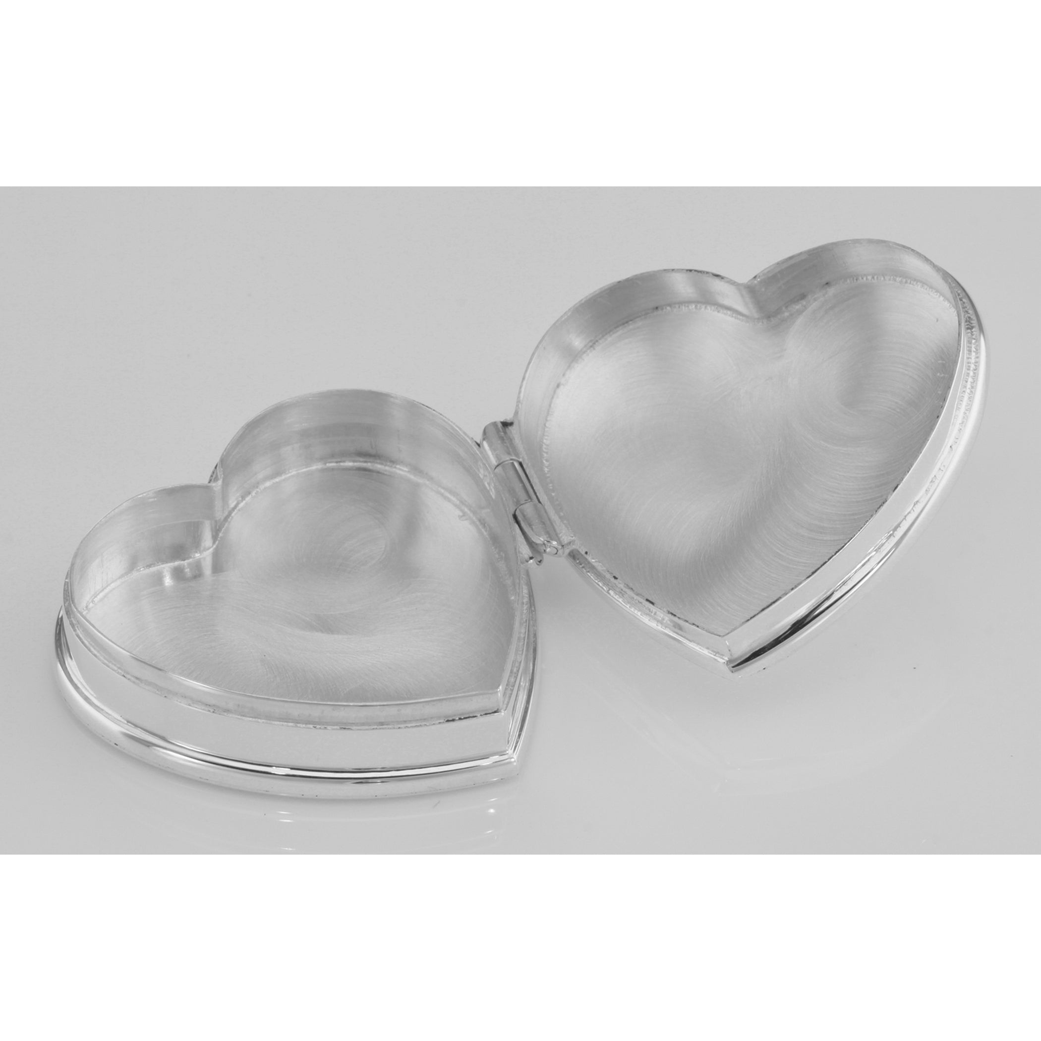 Detail view of Beautiful Heart Shaped Keepsakes Pillbox in Fine Sterling Silver highlighting design details